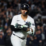 Oct 29, 2024; Bronx, New York, USA; New York Yankees second baseman Gleyber Torres (25) reacts after hitting a three run home run against the Los Angeles Dodgers in the eighth inning during game four of the 2024 MLB World Series at Yankee Stadium. Mandatory Credit: Vincent Carchietta-Imagn Images