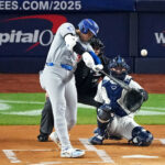 MLB - Oct 30, 2024; New York, New York, USA; Los Angeles Dodgers two-way player Shohei Ohtani (17) flys out during the first inning against the New York Yankees in game four of the 2024 MLB World Series at Yankee Stadium. Mandatory Credit: Robert Deutsch-Imagn Images