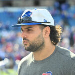 Nov 3, 2024; Orchard Park, New York, USA; Buffalo Bills linebacker Matt Milano (58) on the field in street clothes before a game against the Miami Dolphins at Highmark Stadium.