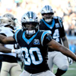 Nov 3, 2024; Charlotte, North Carolina, USA; Carolina Panthers running back Chuba Hubbard (30) celebrates after scoring the winning touchdown in the fourth qarter at Bank of America Stadium. Mandatory Credit: Bob Donnan-Imagn Images