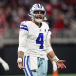Nov 3, 2024; Atlanta, Georgia, USA; Dallas Cowboys quarterback Dak Prescott (4) reacts to a penalty against the Atlanta Falcons in the third quarter at Mercedes-Benz Stadium. Mandatory Credit: Brett Davis-Imagn Images