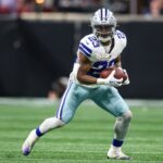 Nov 3, 2024; Atlanta, Georgia, USA; Dallas Cowboys running back Rico Dowdle (23) runs after a catch against the Atlanta Falcons in the fourth quarter at Mercedes-Benz Stadium. Mandatory Credit: Brett Davis-Imagn Images
