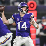 Nov 3, 2024; Minneapolis, Minnesota, USA; Minnesota Vikings quarterback Sam Darnold (14) throws a pass against the Indianapolis Colts during the first quarter at U.S. Bank Stadium. Mandatory Credit: Jeffrey Becker-Imagn Images