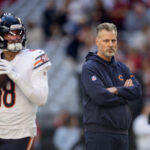 Nov 3, 2024; Glendale, Arizona, USA; Chicago Bears head coach Matt Eberflus watches quarterback Caleb Williams (18) prior to the game against the Arizona Cardinals at State Farm Stadium.