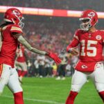 Nov 4, 2024; Kansas City, Missouri, USA; Kansas City Chiefs wide receiver DeAndre Hopkins (8) celebrates with quarterback Patrick Mahomes (15) after scoring against the Tampa Bay Buccaneers during the second half at GEHA Field at Arrowhead Stadium. Mandatory Credit: Denny Medley-Imagn Images