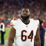 Nov 3, 2024; Glendale, Arizona, USA; Chicago Bears guard Nate Davis (64) against the Arizona Cardinals at State Farm Stadium. Mandatory Credit: Mark J. Rebilas-Imagn Images