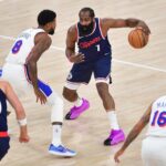 Nov 6, 2024; Inglewood, California, USA; Los Angeles Clippers guard James Harden (1) controls the ball against Philadelphia 76ers forward Paul George (8) during the first half at Intuit Dome. Mandatory Credit: Gary A. Vasquez-Imagn Images