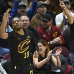 Nov 8, 2024; Cleveland, Ohio, USA; Cleveland Cavaliers guard Darius Garland (10) celebrates a three-point basket in the fourth quarter against the Golden State Warriors at Rocket Mortgage FieldHouse.