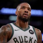 Nov 8, 2024; New York, New York, USA; Milwaukee Bucks guard Damian Lillard (0) reacts during the second quarter against the New York Knicks at Madison Square Garden. Mandatory Credit: Brad Penner-Imagn Images