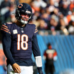 Nov 10, 2024; Chicago, Illinois, USA; Chicago Bears quarterback Caleb Williams (18) reacts after a pass against the New England Patriots during the second half at Soldier Field. Mandatory Credit: Mike Dinovo-Imagn Images