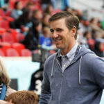 Nov 10, 2024; Harrison, New Jersey, USA; NJ/NY Gotham FC minority owner Eli Manning looks on before a 2024 NWSL Playoffs quarterfinal match against Portland Thorns FC at Red Bull Arena.