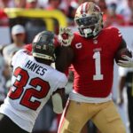 Nov 10, 2024; Tampa, Florida, USA; San Francisco 49ers wide receiver Deebo Samuel Sr. (1) stiff arms Tampa Bay Buccaneers safety Josh Hayes (32) during the second half at Raymond James Stadium.