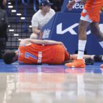 Nov 10, 2024; Oklahoma City, Oklahoma, USA; Oklahoma City Thunder forward Chet Holmgren (7) holds his leg after a hard following a play against the Golden State Warriors during the first quarter at Paycom Center. Mandatory Credit: Alonzo Adams-Imagn Images