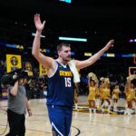 Nov 10, 2024; Denver, Colorado, USA; Denver Nuggets center Nikola Jokic (15) following the win over the Dallas Mavericks at Ball Arena. Mandatory Credit: Ron Chenoy-Imagn Images
