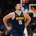 Nov 10, 2024; Denver, Colorado, USA; NBA; Denver Nuggets center Nikola Jokic (15) reacts in the second half against the Dallas Mavericks at Ball Arena.