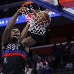 Nov 12, 2024; Detroit, Michigan, USA; Detroit Pistons center Jalen Duren (0) dunks in overtime against the Miami Heat at Little Caesars Arena. Mandatory Credit: Rick Osentoski-Imagn Images