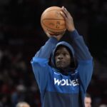 Nov 13, 2024; Portland, Oregon, USA; Minnesota Timberwolves shooting guard Anthony Edwards (5) warms up before the game against the Portland Trail Blazers at Moda Center.
