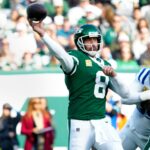 New York Jets quarterback Aaron Rodgers (8) throws the ball during the second quarter, Sunday, November 17, 2024, in East Rutherford.