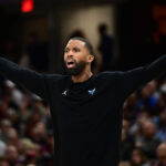 Nov 17, 2024; Cleveland, Ohio, USA; Charlotte Hornets head coach Charles Lee reacts during the second half against the Cleveland Cavaliers at Rocket Mortgage FieldHouse.