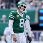 Nov 17, 2024; East Rutherford, New Jersey, USA; New York Jets quarterback Aaron Rodgers (8) reacts during the first quarter against the Indianapolis Colts at MetLife Stadium. Mandatory Credit: Brad Penner-Imagn Images