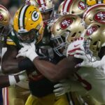 NFL; Green Bay Packers running back Ty Montgomery (88) is swarmed by he San Francisco 49ers defense during the second quarter of their game Monday, October 15, 2018, at Lambeau Field in Green Bay, Wis. The Green Bay Packer beat the San Francisco 49ers 33-30.