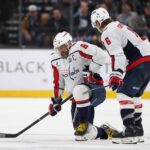Nov 18, 2024; Salt Lake City, Utah, USA; Washington Capitals left wing Alex Ovechkin (8) is injured on a play against the Utah Hockey Club during the third period at Delta Center. Mandatory Credit: Rob Gray-Imagn Images
