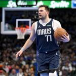 Nov 19, 2024; Dallas, Texas, USA; Dallas Mavericks guard Luka Doncic (77) brings the ball up court against the New Orleans Pelicans during the second half at the American Airlines Center.