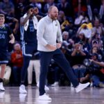 Nov 20, 2024; Memphis, Tennessee, USA; Memphis Grizzlies head coach Taylor Jenkins reacts during a time out during the second half against the Philadelphia 76ers at FedExForum. Mandatory Credit: Petre Thomas-Imagn Images