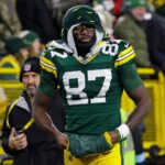 Green Bay Packers wide receiver Romeo Doubs (87) leaves the field after getting injured on a pass interference play commited by San Francisco 49ers cornerback Renardo Green (0) in the third quarter during their football game Sunday, November 24, 2024, at Lambeau Field in Green Bay, Wisconsin.