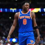 Nov 25, 2024; Denver, Colorado, USA; New York Knicks forward OG Anunoby (8) reacts in the second half against the Denver Nuggets at Ball Arena. Mandatory Credit: Ron Chenoy-Imagn Images