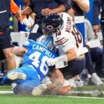 Detroit Lions linebacker Jack Campbell (46) tackles Chicago Bears quarterback Caleb Williams (18) during the second half at Ford Field in Detroit on Thursday, Nov. 28, 2024.