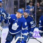 Toronto Maple Leafs forward William Nylander (88) celebrates with teammates at the bench after scoring against the Utah Hockey Club in the second period at Scotiabank Arena.