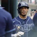 Wander Franco - Aug 6, 2023; Detroit, Michigan, USA; Tampa Bay Rays shortstop Wander Franco (5) receives congratulations from teammates after scoring in the sixth inning against the Detroit Tigers at Comerica Park.