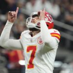 Kansas City Chiefs place kicker Harrison Butker (7) reacts after a field goal against the Las Vegas Raiders in the second half at Allegiant Stadium.