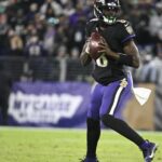 Baltimore Ravens quarterback Lamar Jackson (8) drops back to pass during the game against the Philadelphia Eagles at M&T Bank Stadium.