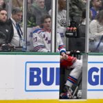 New York Rangers center Matt Rempe (73) sits in the penalty box after receiving a penalty for an elbow on Dallas Stars defenseman Miro Heiskanen (not pictured) during the third period at the American Airlines Center.