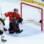Boston Bruins center Morgan Geekie (39) scores against Chicago Blackhawks goalie Petr Mrazek (34) during the third period at United Center.