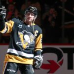 Pittsburgh Penguins center Sidney Crosby (87) reacts to being named first star of the game against the Philadelphia Flyers at PPG Paints Arena.
