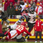 Houston Texans wide receiver Tank Dell (3) catches a touchdown pass against Kansas City Chiefs cornerback Trent McDuffie (22) during the second half at GEHA Field at Arrowhead Stadium.