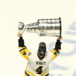 Jun 11, 2017; Nashville, TN, USA; Pittsburgh Penguins defenseman Justin Schultz (4) skates with the Stanley Cup after defeating the Nashville Predators in game six of the 2017 Stanley Cup Final at Bridgestone Arena. Mandatory Credit: Aaron Doster-USA TODAY Sports