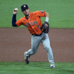Oct 17, 2020; San Diego, California, USA; Houston Astros third baseman Alex Bregman (2) throws to first for the out against Tampa Bay Rays center fielder Manuel Margot (13) during the seventh inning in game seven of the 2020 ALCS at Petco Park. Mandatory Credit: Orlando Ramirez-USA TODAY Sports