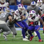 NFL; Lions defenders tackle Bills quarterback Josh Allen during the second half of the Lions' 28-25 loss on Thursday, Nov. 24, 2022, at Ford Field.