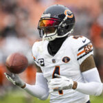 Dec 17, 2023; Cleveland, Ohio, USA; Chicago Bears safety Eddie Jackson (4) catches the ball during warm ups before the game against the Cleveland Browns at Cleveland Browns Stadium. Mandatory Credit: Scott Galvin-USA TODAY Sports