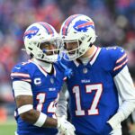 Dec 31, 2023; Orchard Park, New York, USA; Buffalo Bills quarterback Josh Allen (17) has a word with wide receiver Stefon Diggs (14) between plays in the third quarter game against the New England Patriots at Highmark Stadium. Mandatory Credit: Mark Konezny-USA TODAY Sports