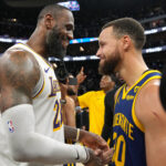 Jan 27, 2024; San Francisco, California, USA; NBA; Los Angeles Lakers forward LeBron James (left) and Golden State Warriors guard Stephen Curry (right) greet each other after the game at Chase Center.