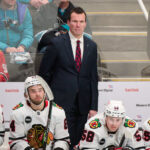 Mar 23, 2024; San Jose, California, USA; Chicago Blackhawks head coach Luke Richardson watches game play against the San Jose Sharks during the third period at SAP Center at San Jose.