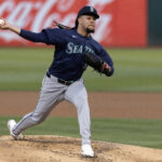 Sep 3, 2024; Oakland, California, USA; Seattle Mariners starting pitcher Luis Castillo (58) delivers a pitch against the Oakland Athletics during the first inning at Oakland-Alameda County Coliseum. Mandatory Credit: D. Ross Cameron-Imagn Images