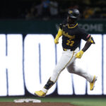 Sep 10, 2024; Pittsburgh, Pennsylvania, USA; Pittsburgh Pirates designated hitter Andrew McCutchen (22) circles the bases on a three run home run against the Miami Marlins during the fifth inning at PNC Park. Mandatory Credit: Charles LeClaire-Imagn Images