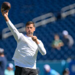 Sep 15, 2024; Nashville, Tennessee, USA; New York Jets quarterback Aaron Rodgers (8) throws during pregame warmups against the Tennessee Titans at Nissan Stadium.