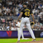 Sep 27, 2024; Bronx, New York, USA; Pittsburgh Pirates pitcher Aroldis Chapman (45) reacts after the games final out against the New York Yankees at Yankee Stadium. Mandatory Credit: John Jones-Imagn Images